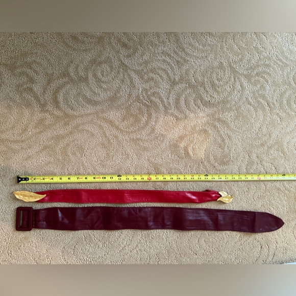 TWO Vintage 80\'s Leather Belts. One Red  with Gold Leaf Buckle. One Burgundy.